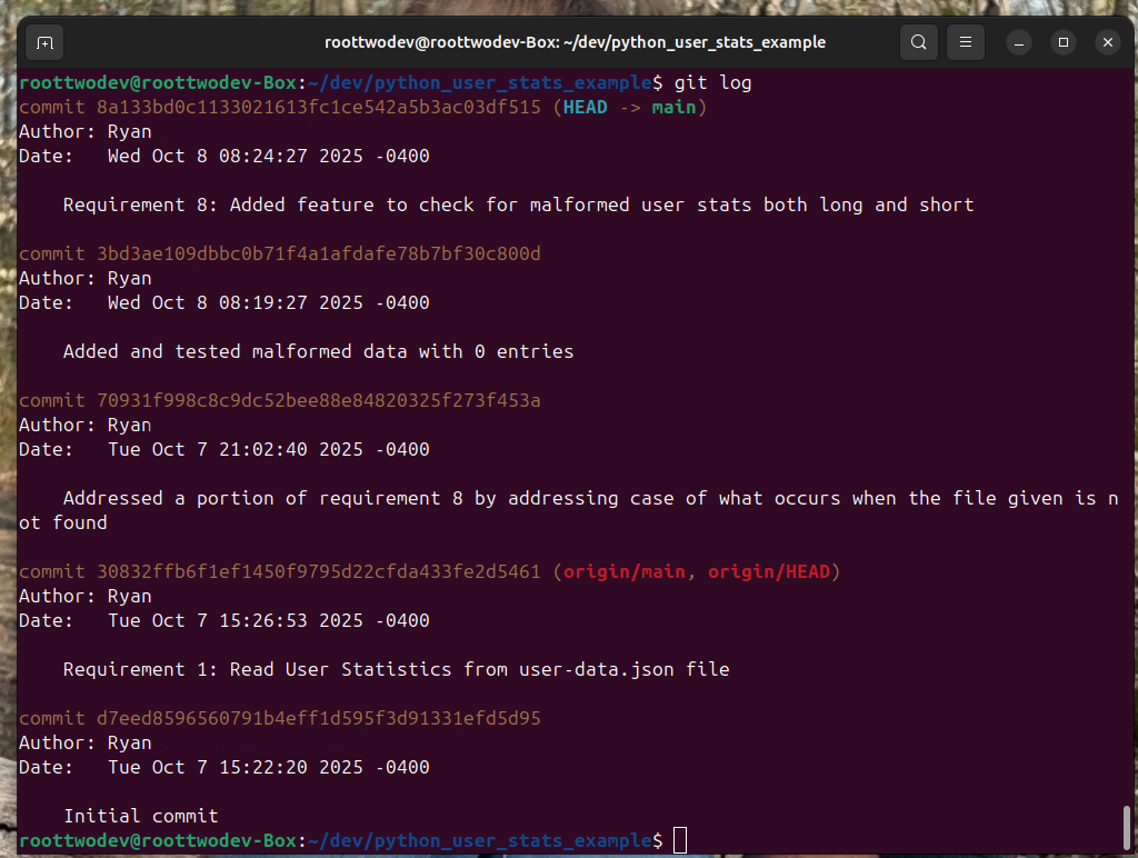 A command prompt with the output of a git log command including five git commits